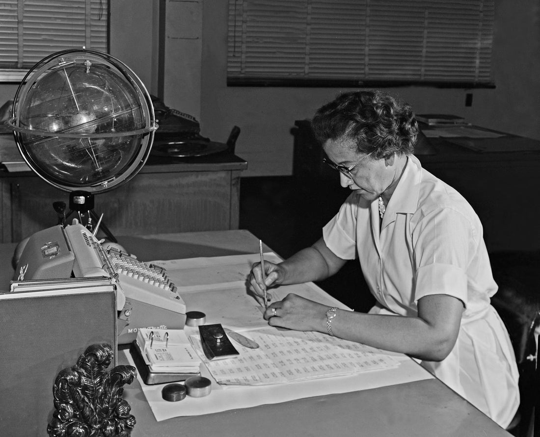 Katherine Johnson NASA mathematician working calculations Apollo mission Black excellence story